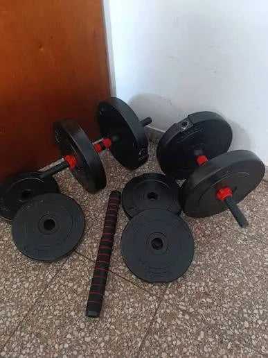 Mancuernas con discos recibidas por el cliente